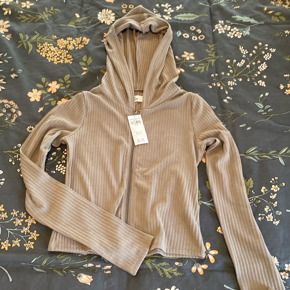 Pretty zip up top.